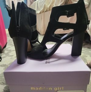 Madden Girl black faux-suede heels with buckle detail.